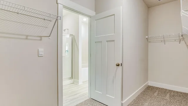 a view of a bathroom with shower