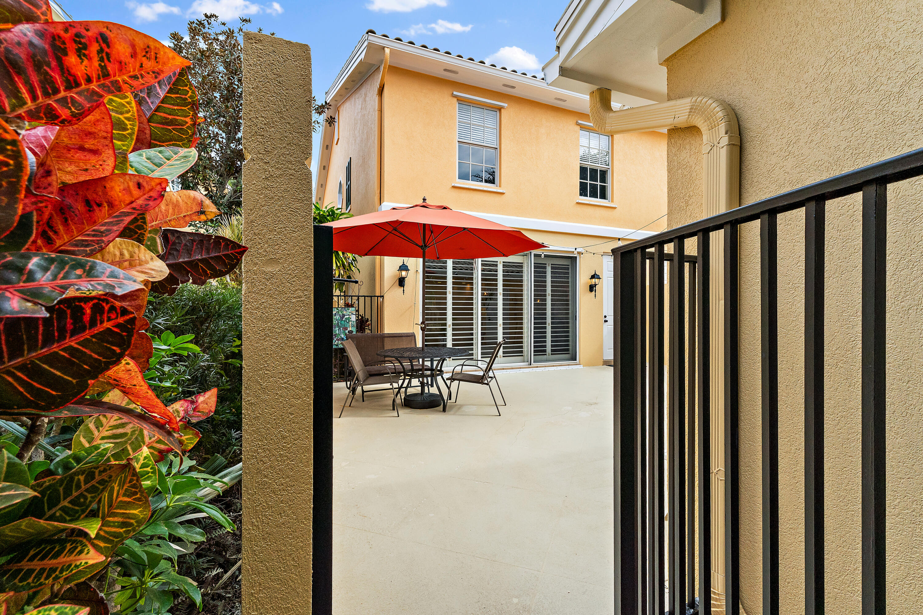 4050 Parkside Drive Jupiter, FL 33458 - Photo 46 of 59 Side Entry to Patio