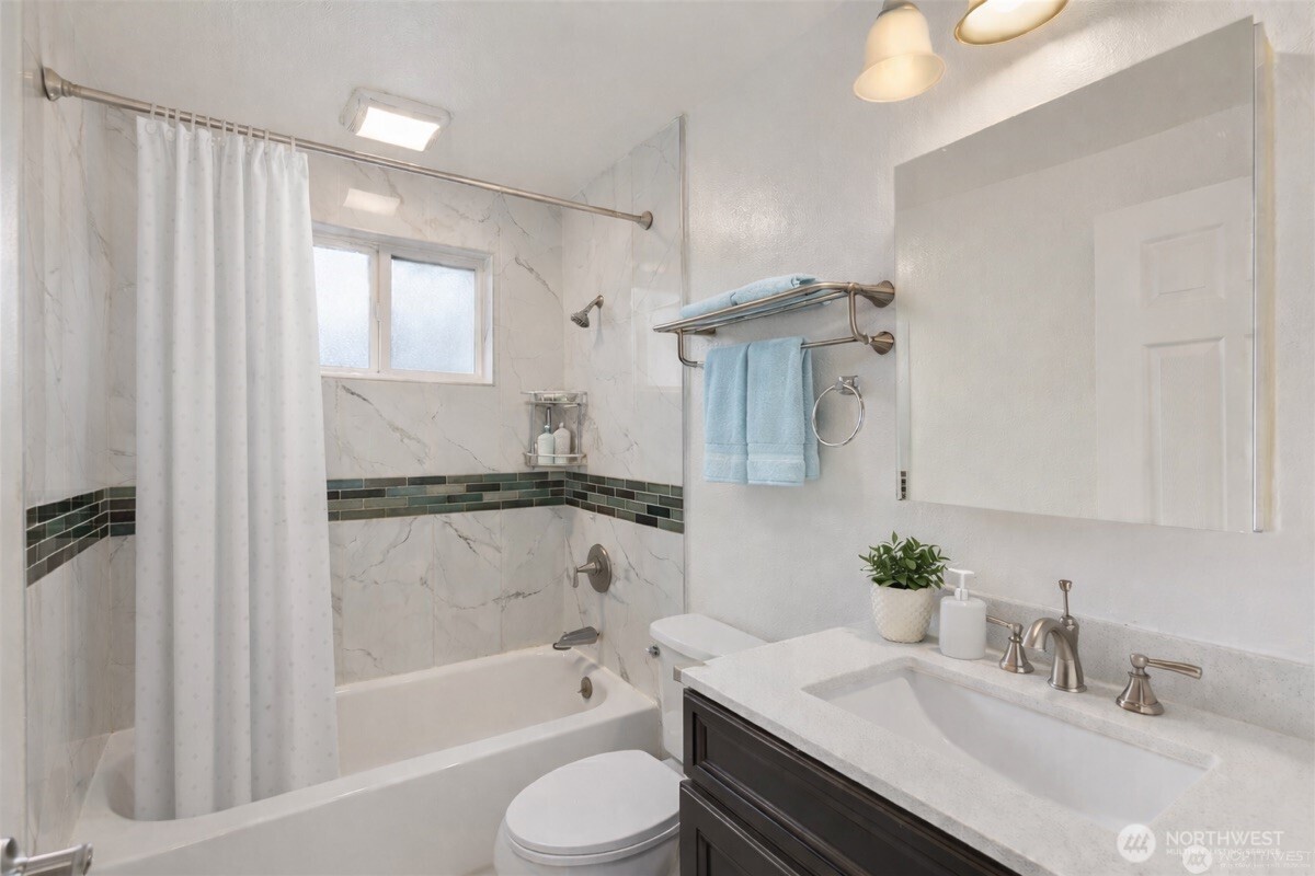 31368 13th Avenue South Federal Way, WA 98003 - Photo 16 of 36 a bathroom with a sink toilet and shower