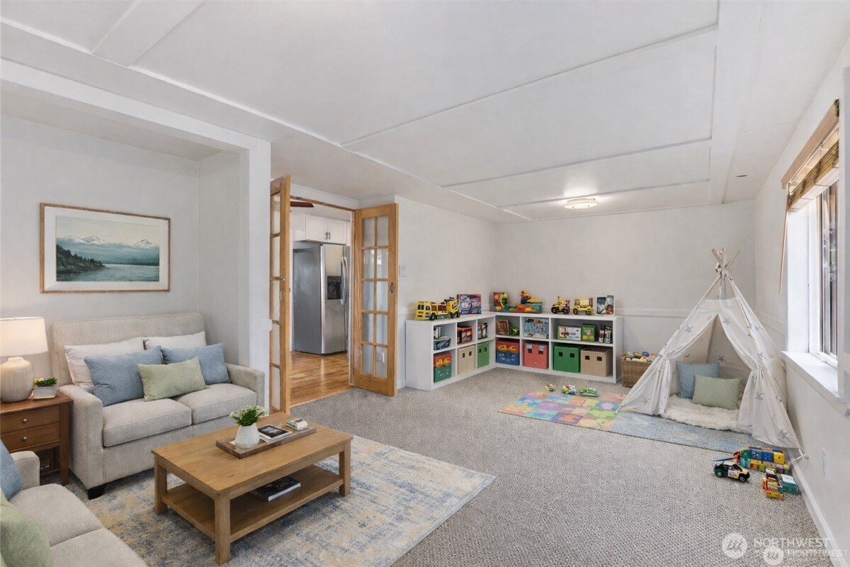 31368 13th Avenue South Federal Way, WA 98003 - Photo 26 of 36 a living room with furniture a rug and white walls