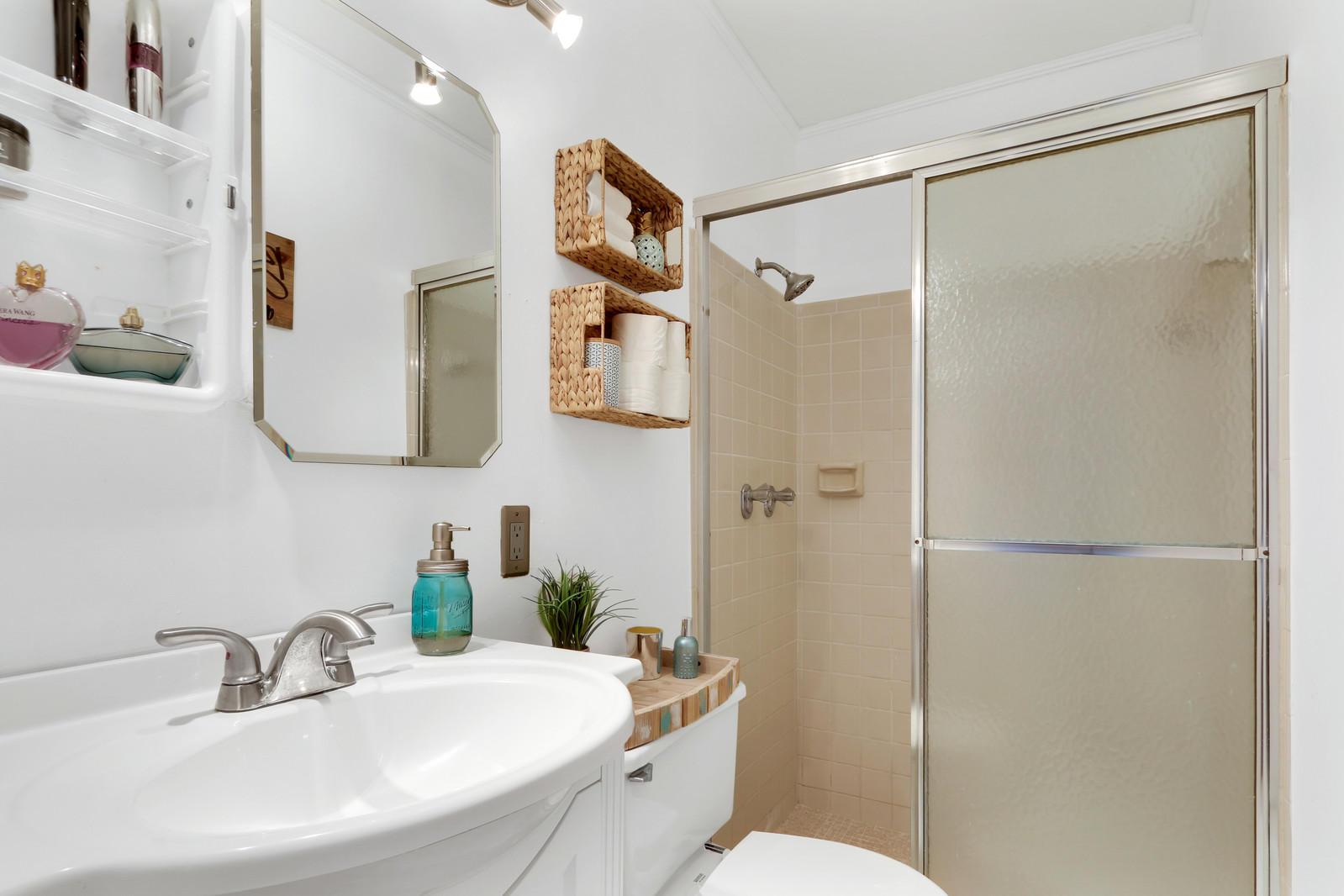 19501 Carolina Circle Boca Raton, FL 33434 - Photo 16 of 19 a bathroom with a sink toilet and shower