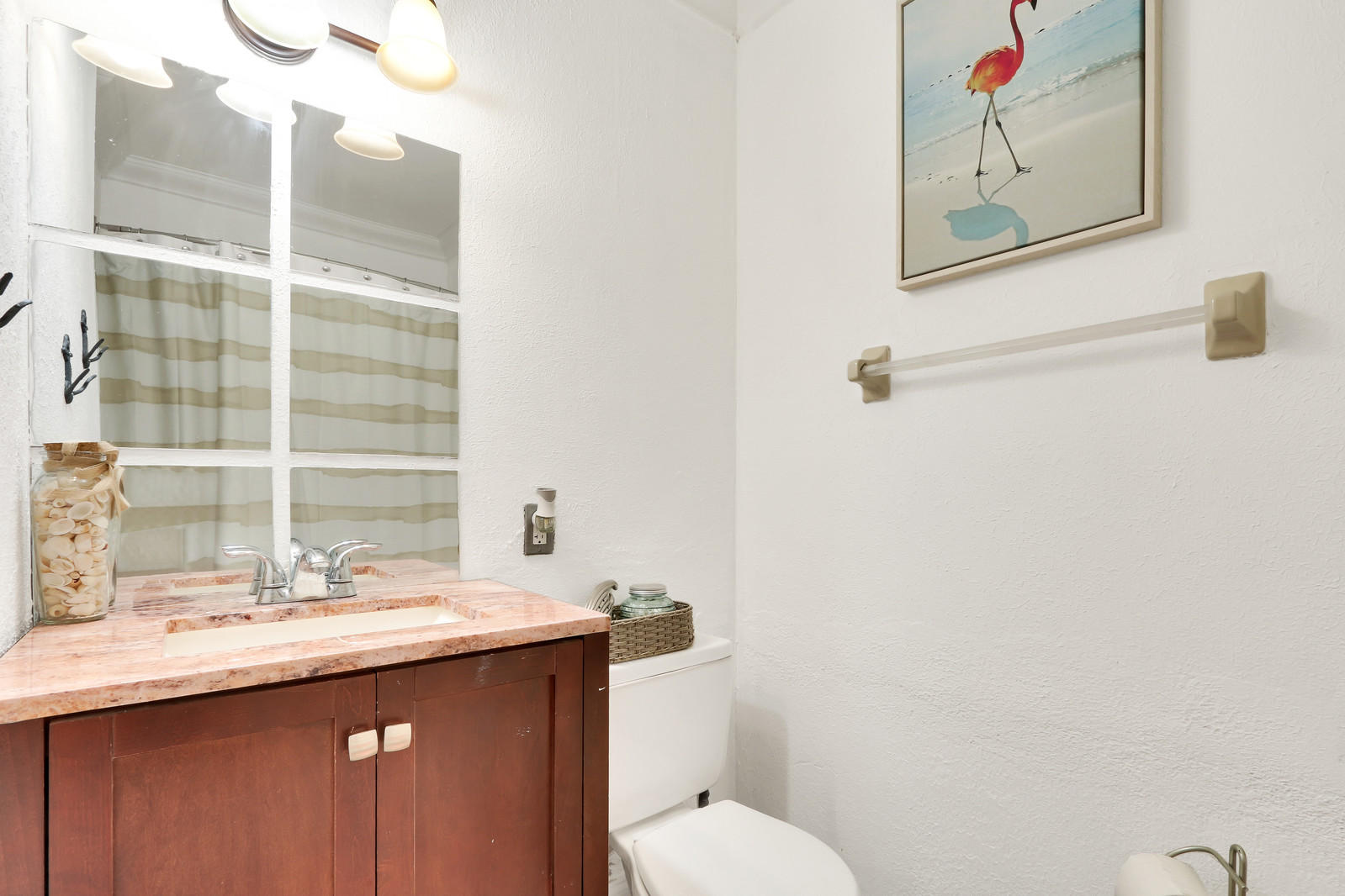 19501 Carolina Circle Boca Raton, FL 33434 - Photo 18 of 19 a bathroom with a granite countertop sink mirror and a toilet