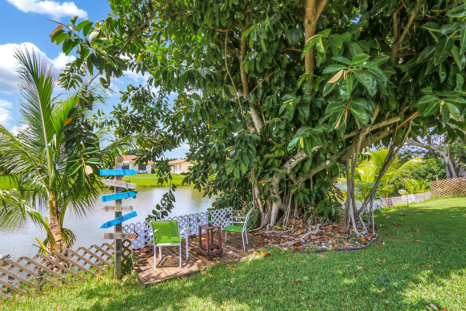 19501 Carolina Circle Boca Raton, FL 33434 - Photo 5 of 19 a view of a table and chairs in the garden