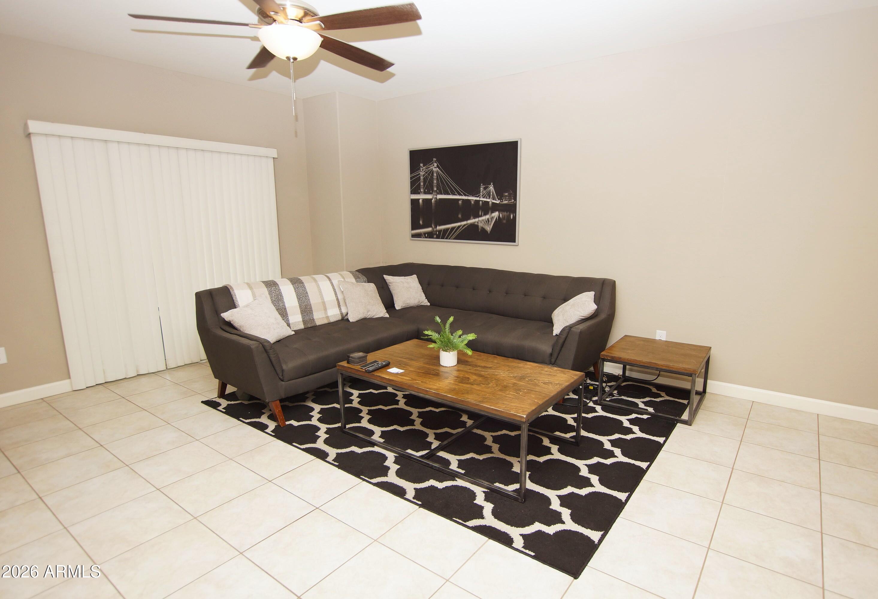 2150 West Alameda Road, Unit 1095 Phoenix, AZ 85085 - Photo 11 of 32 a living room with furniture