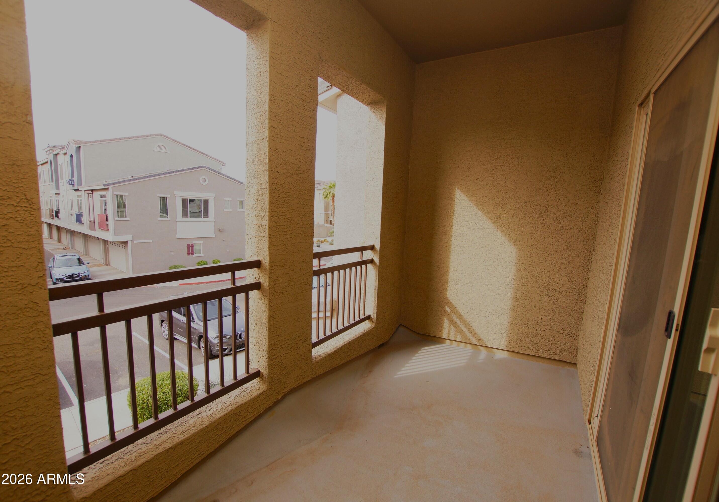 2150 West Alameda Road, Unit 1095 Phoenix, AZ 85085 - Photo 16 of 32 a view of a balcony with an outdoor space