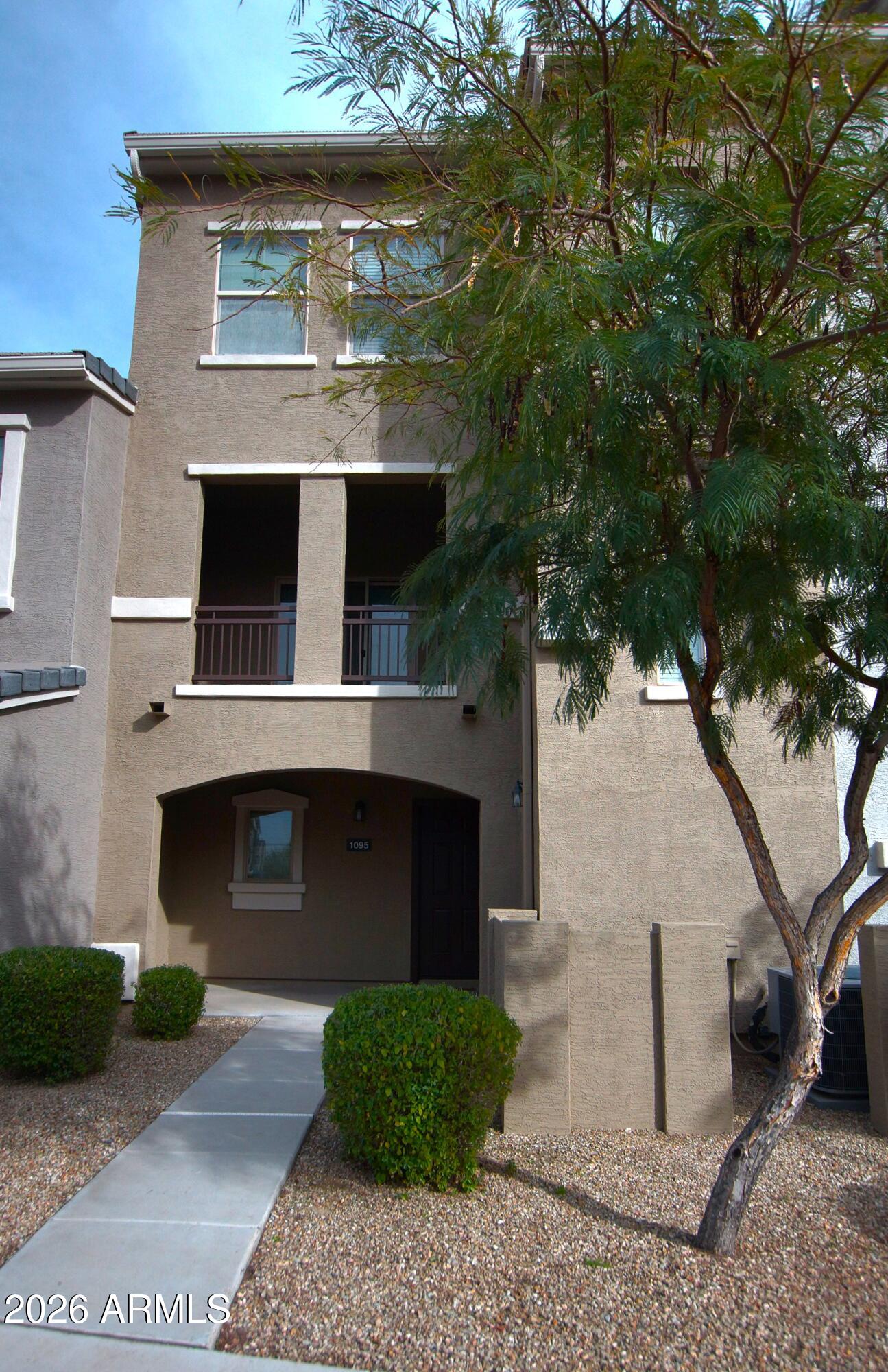 2150 West Alameda Road, Unit 1095 Phoenix, AZ 85085 - Photo 4 of 32 a front view of a house
