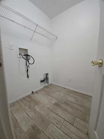 a view of a room with racks on the wall