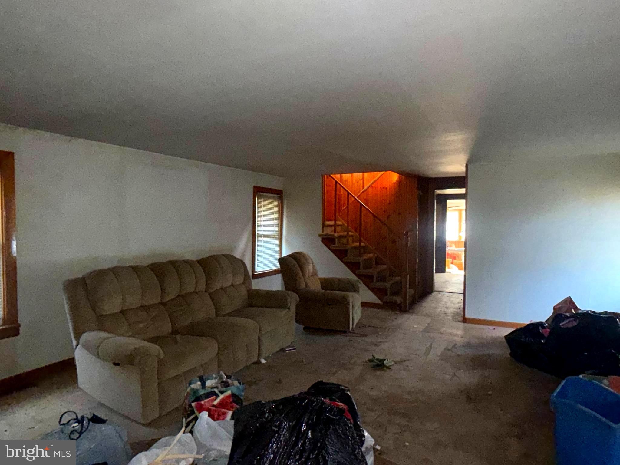 1557 Erial Road Clementon, NJ 08021 - Photo 11 of 20 a living room with furniture and a mirror