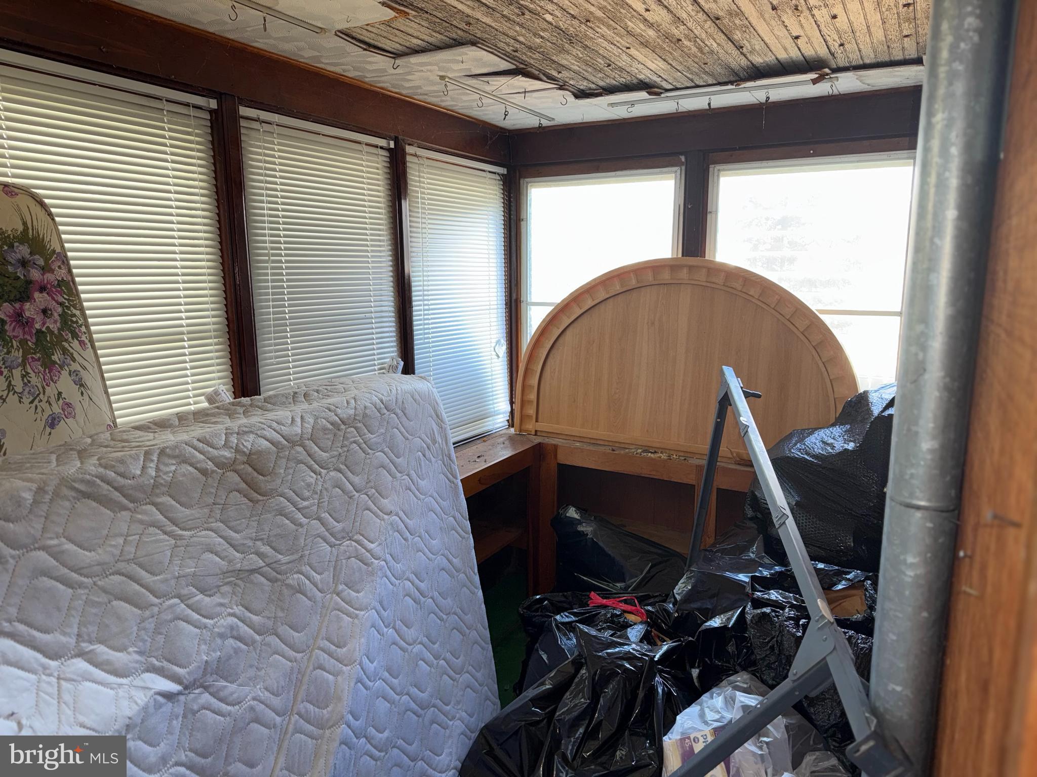 1557 Erial Road Clementon, NJ 08021 - Photo 12 of 20 a bed sitting in a room next to a window