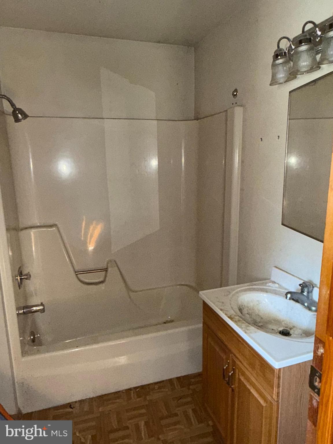 1557 Erial Road Clementon, NJ 08021 - Photo 14 of 20 a bathroom with a sink a mirror and a bathtub