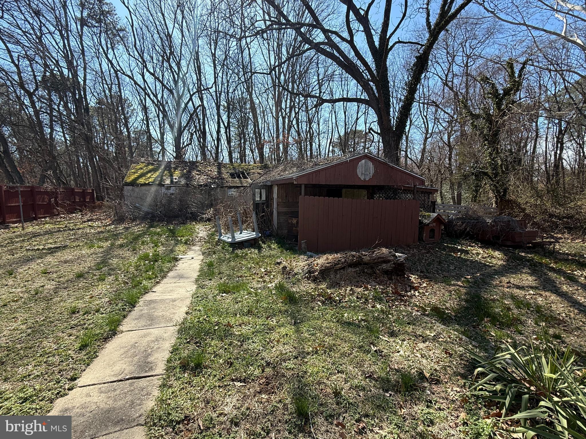 1557 Erial Road Clementon, NJ 08021 - Photo 16 of 20 a front view of a house with a yard and a garden