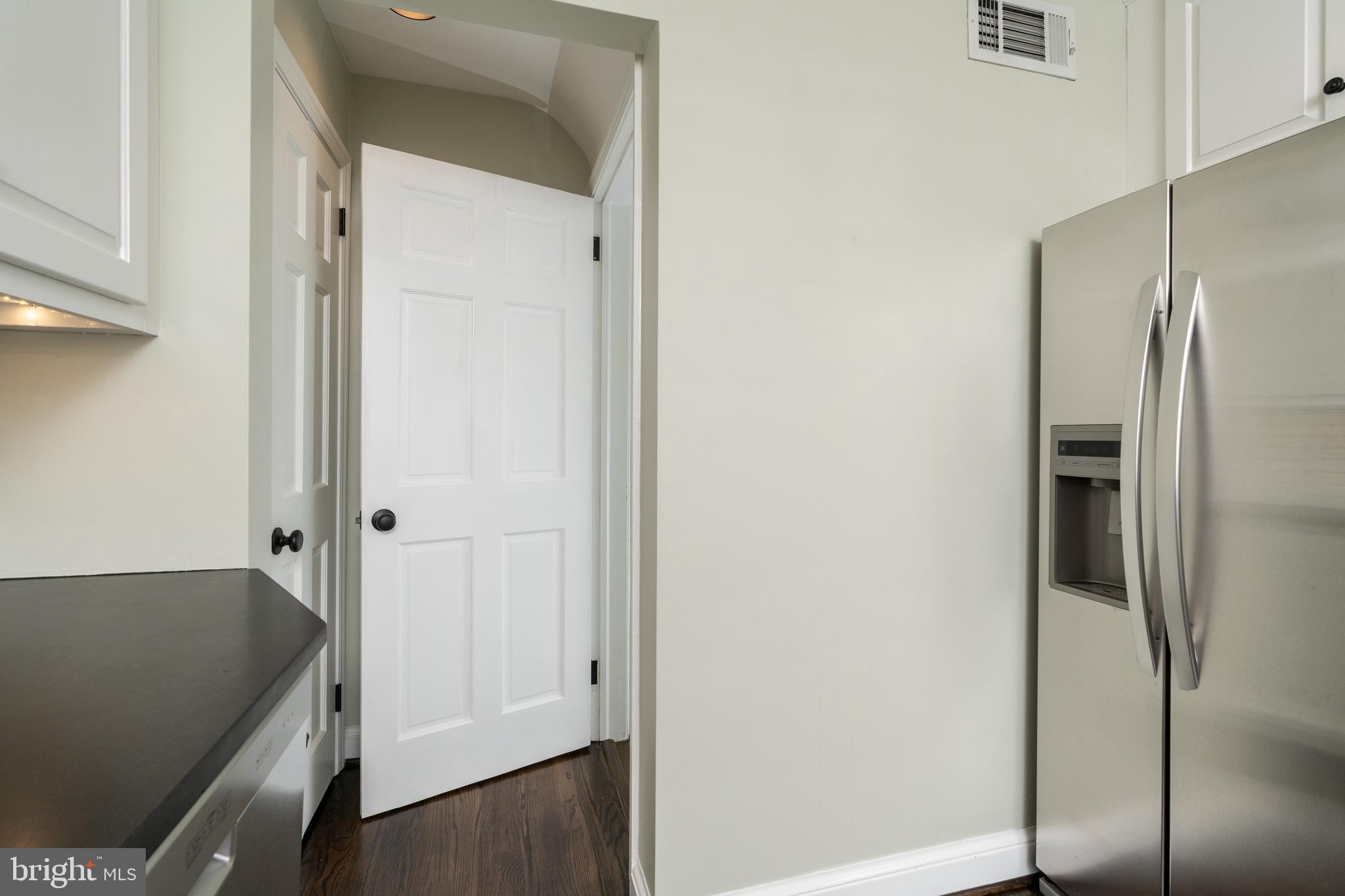 603 Russell Road Alexandria, VA 22301 - Photo 42 of 58 Entrance to lower level stairs off kitchen