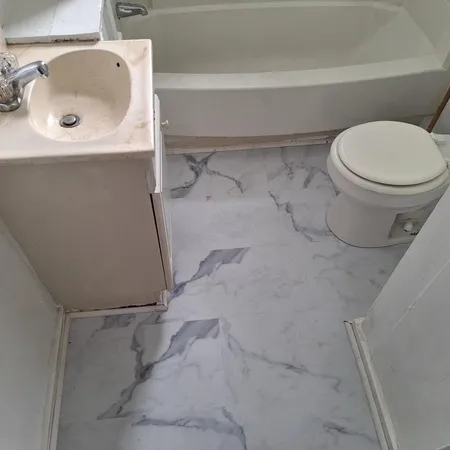 a bathroom with a sink and a toilet