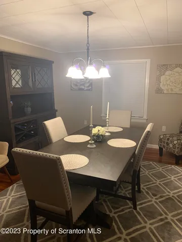 a view of a dining room with furniture