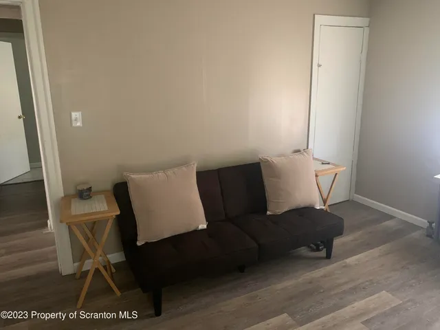 a living room with a couch and a coffee table