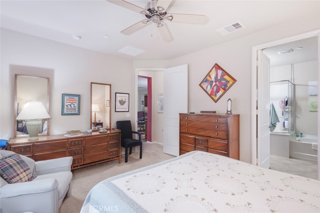 1370 Corte Alamonte Hemet, CA 92545 - Photo 17 of 62 a bedroom with a bed and furniture