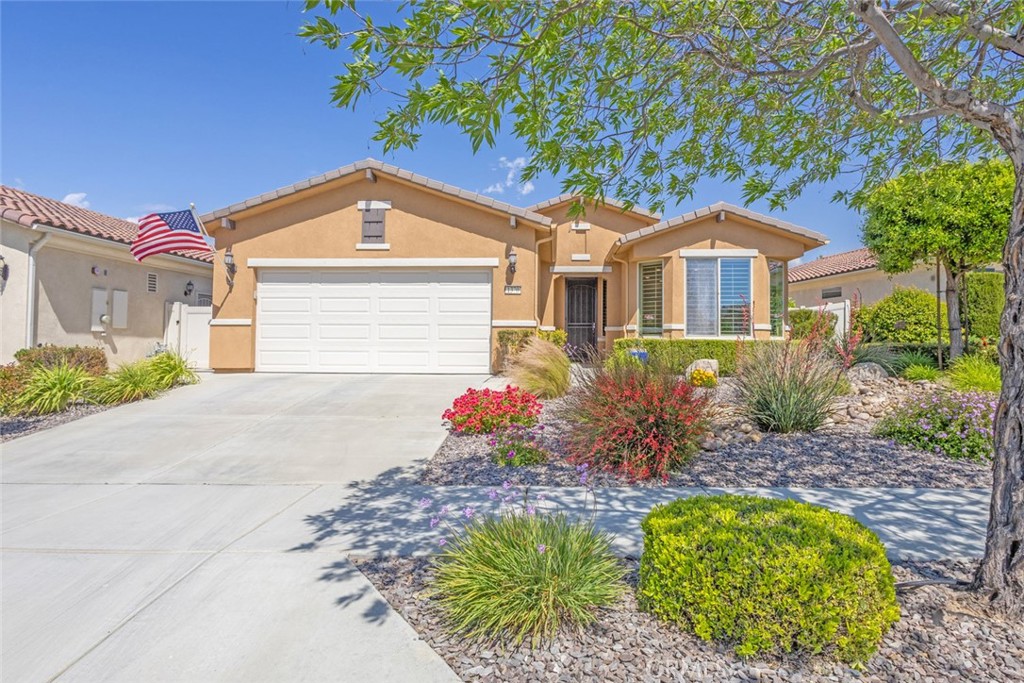 1370 Corte Alamonte Hemet, CA 92545 - Photo 2 of 62 a front view of a house with a yard