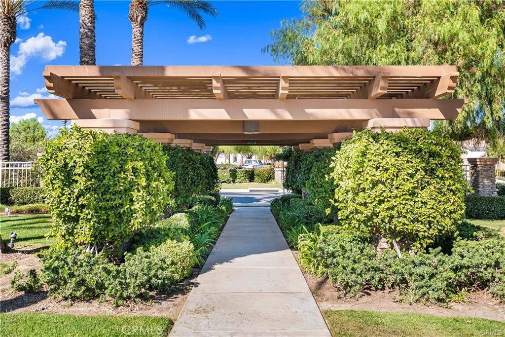 1370 Corte Alamonte Hemet, CA 92545 - Photo 51 of 62 a view of a pathway with flower on side of it