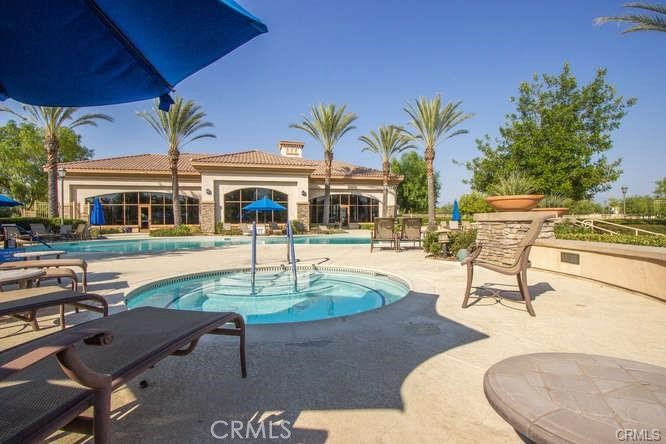 1370 Corte Alamonte Hemet, CA 92545 - Photo 53 of 62 a swimming pool with outdoor seating