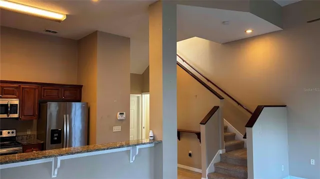 a view of entryway with a front door