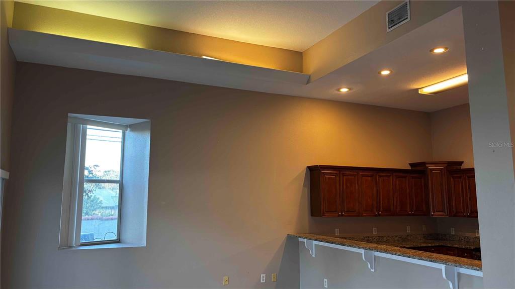 9410 Citrus Glen Place Tampa, FL 33618 - Photo 6 of 30 a bathroom with a sink and a mirror
