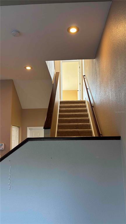 9410 Citrus Glen Place Tampa, FL 33618 - Photo 7 of 30 a view of an empty room with stairs