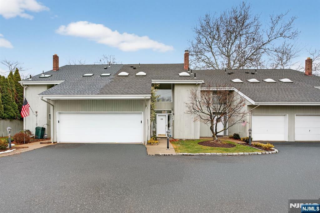 7 Hopson Avenue, Unit B Little Falls, NJ 07424 - Photo 1 of 24 a view of a house with a yard
