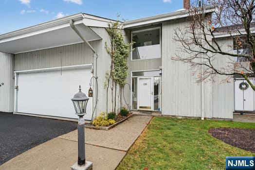 7 Hopson Avenue, Unit B Little Falls, NJ 07424 - Photo 2 of 24 a front view of a house with garden