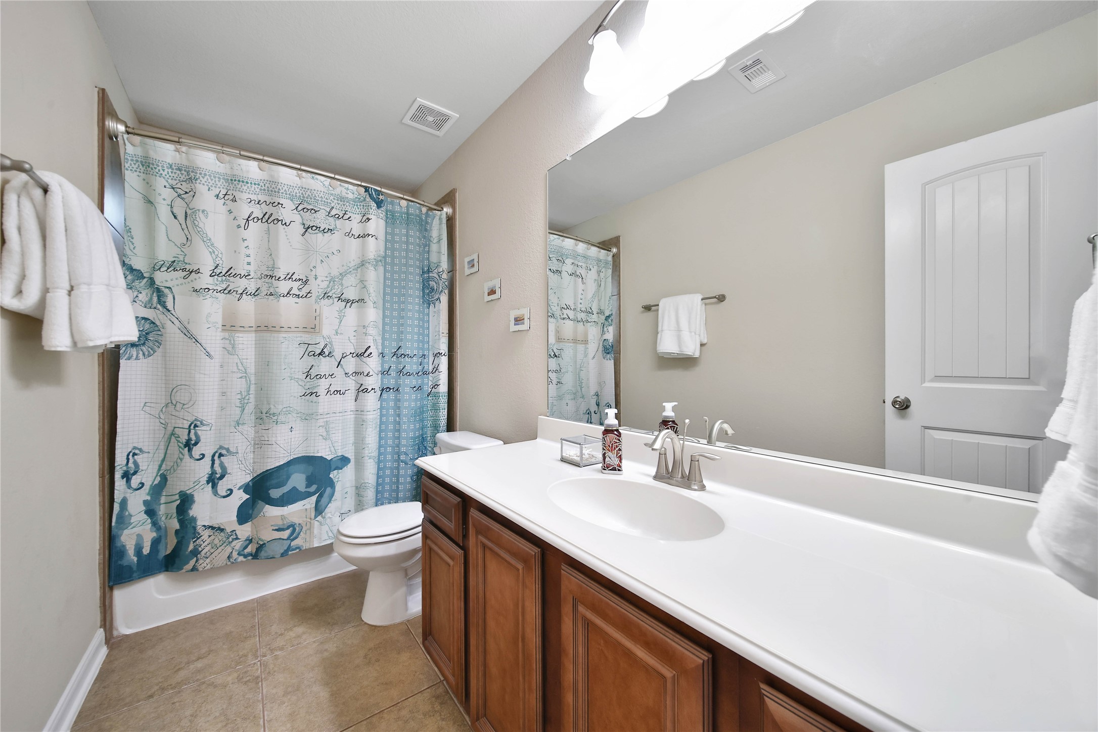 9223 Wapiti Trail Conroe, TX 77303 - Photo 34 of 45 a bathroom with a sink and a mirror