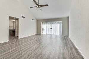 4539 North O'Connor Road, Unit 2233 Irving, TX 75062 - Photo 4 of 11 wooden floor in an empty room with a window