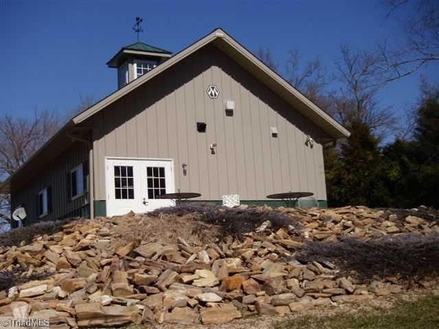 390 Chilton Road Ruffin, NC 27326 - Photo 7 of 16 Other. back view of morton building patio overlooking the pond great for weekend cook outs