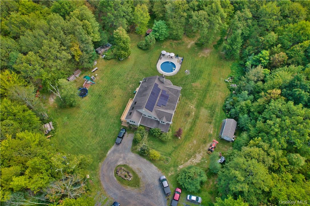 75 Monahan Road Port Jervis, NY 12771 - Photo 13 of 36 an aerial view of a house with a yard and swimming pool