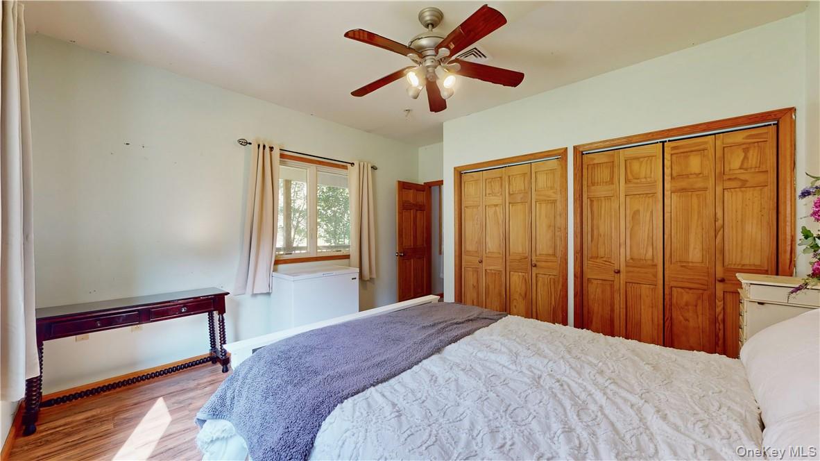 75 Monahan Road Port Jervis, NY 12771 - Photo 22 of 36 a bedroom with a bed and a window