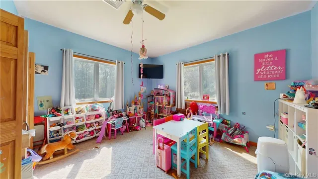 a children room with toys and a bed