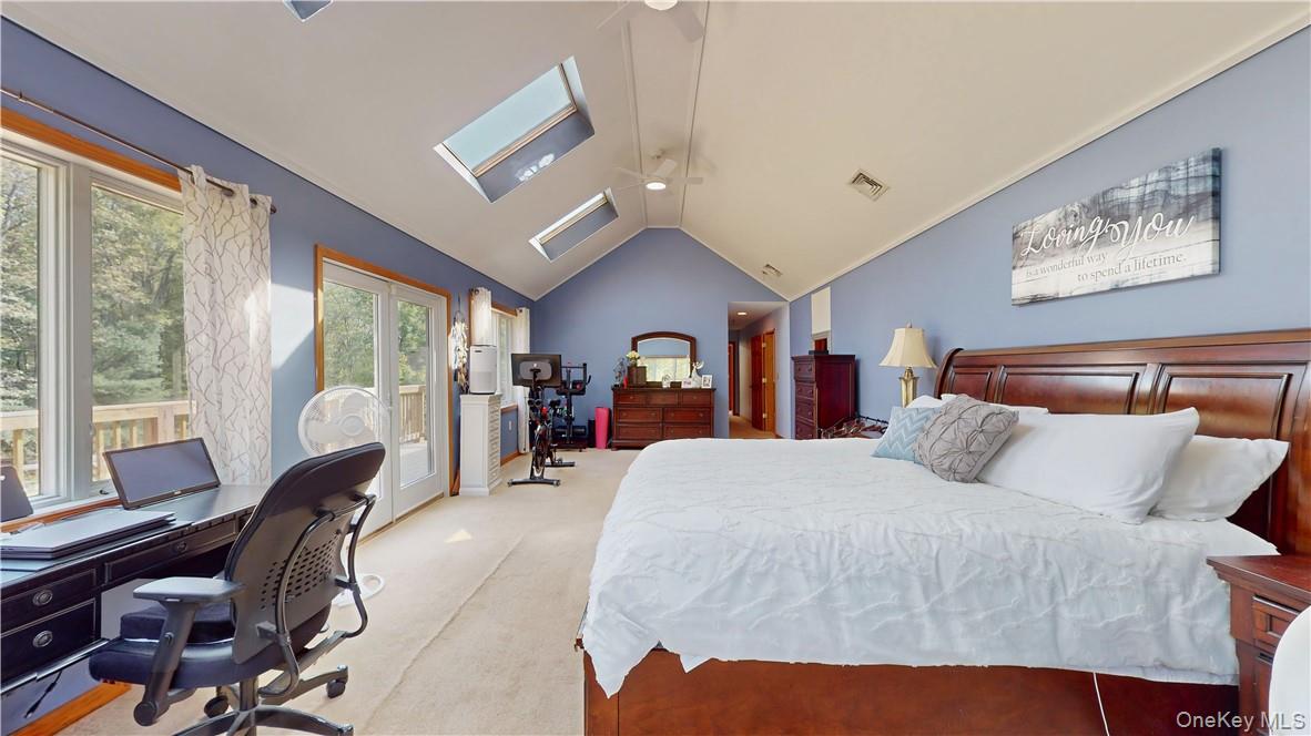 75 Monahan Road Port Jervis, NY 12771 - Photo 26 of 36 a bedroom with a bed gym equipment and a large window