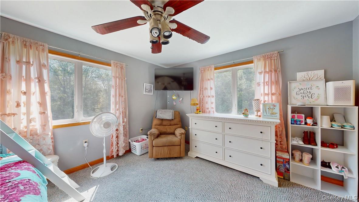 75 Monahan Road Port Jervis, NY 12771 - Photo 29 of 36 a bed room with a bed and a window