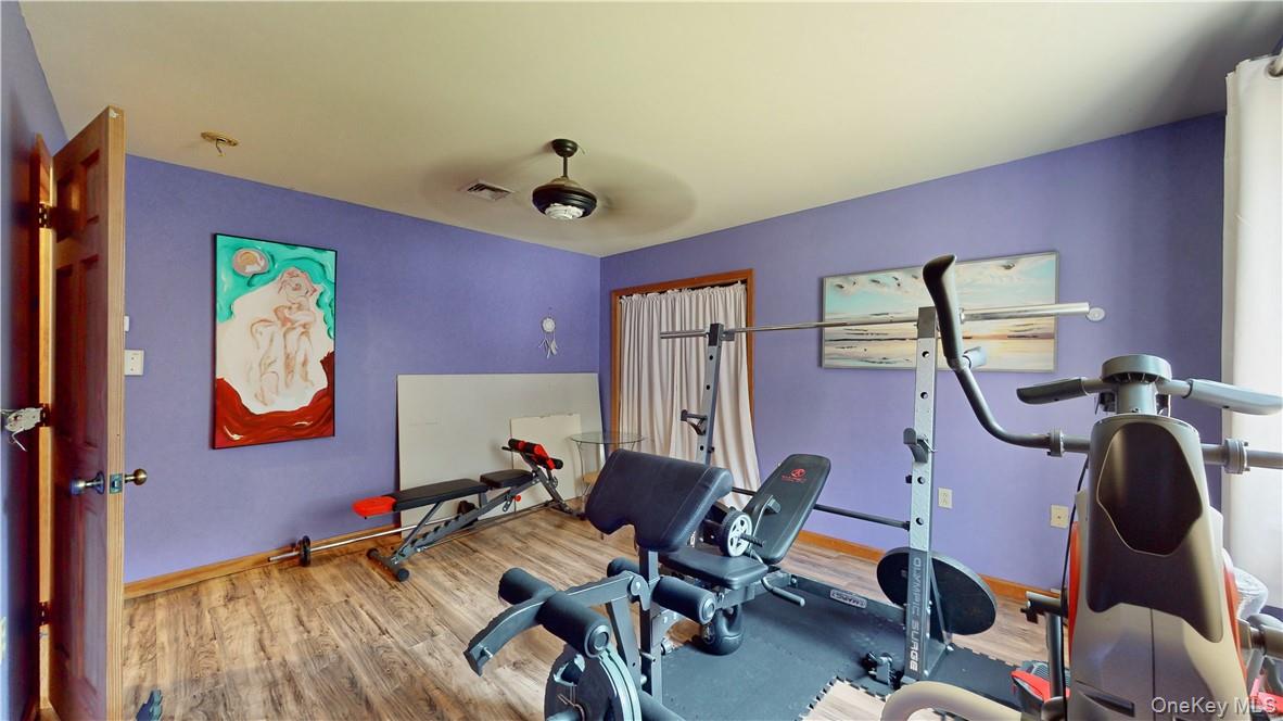75 Monahan Road Port Jervis, NY 12771 - Photo 31 of 36 a work room with furniture and wooden floor