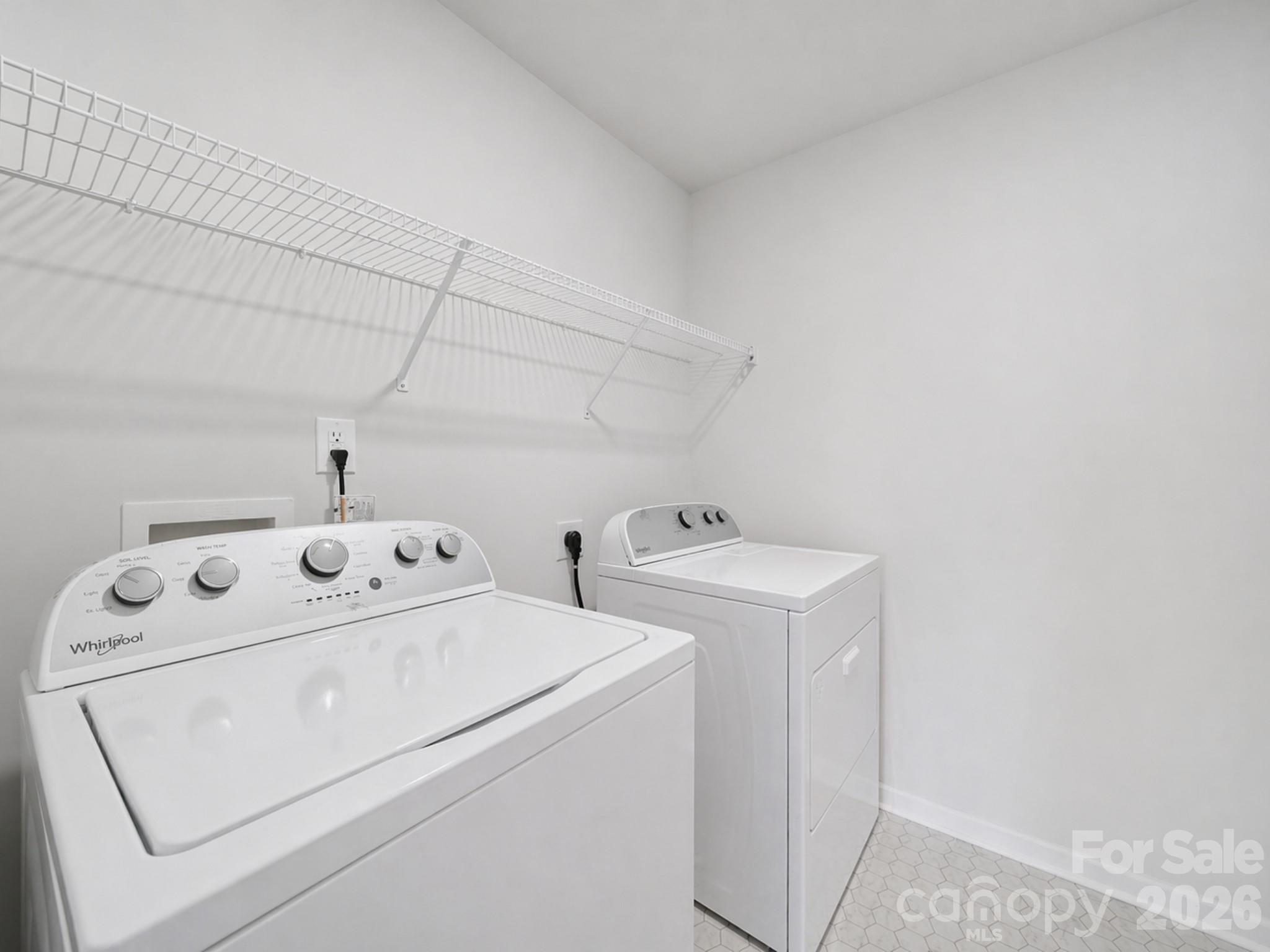 107 Spring Hall Court Troutman, NC 28166 - Photo 24 of 28 a utility room with dryer and washer