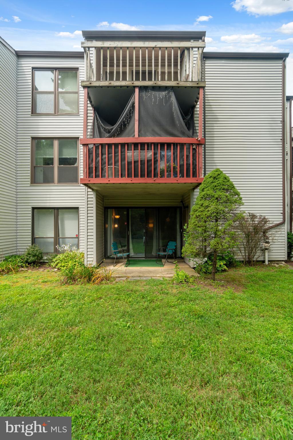 5390 Smooth Meadow Way, Unit B2D02 Columbia, MD 21044 - Photo 20 of 28 a front view of a house with garden