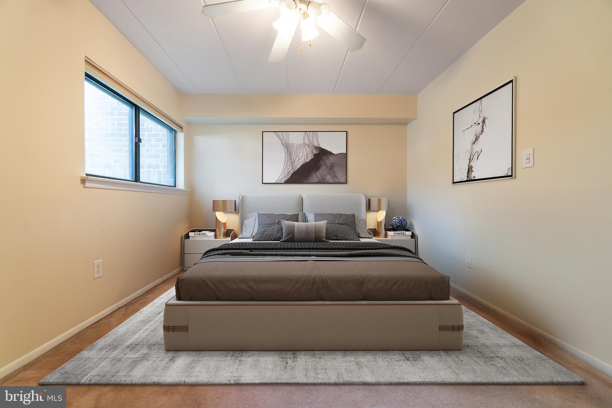 5390 Smooth Meadow Way, Unit B2D02 Columbia, MD 21044 - Photo 2 of 28 a bedroom with bed and window