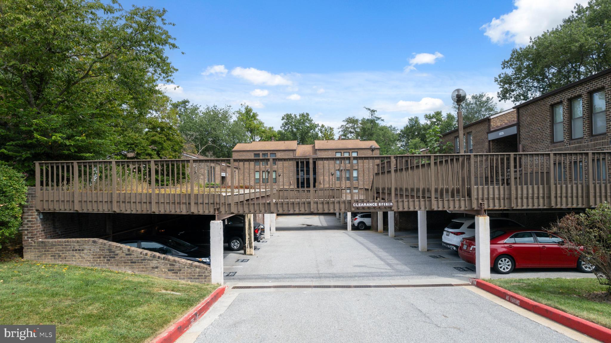 5390 Smooth Meadow Way, Unit B2D02 Columbia, MD 21044 - Photo 21 of 28 a view of a swimming pool with a patio and a yard