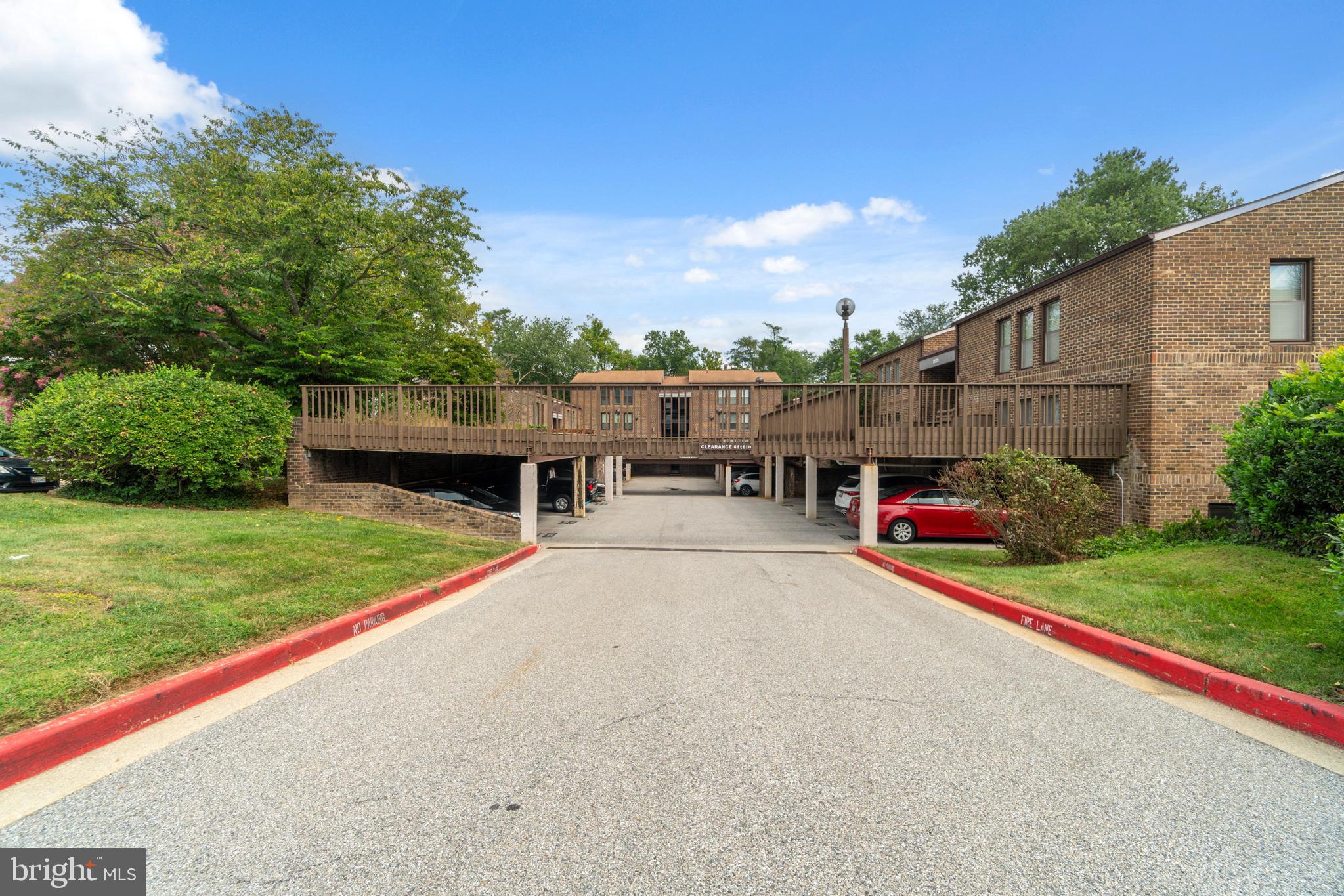 5390 Smooth Meadow Way, Unit B2D02 Columbia, MD 21044 - Photo 27 of 28 a view of a house with backyard and garden