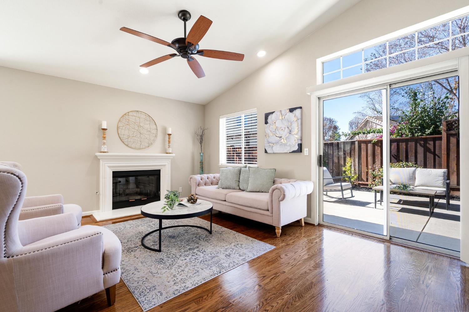 1363 Rincon Avenue Livermore, CA 94551 - Photo 27 of 65 a living room with furniture and a fireplace