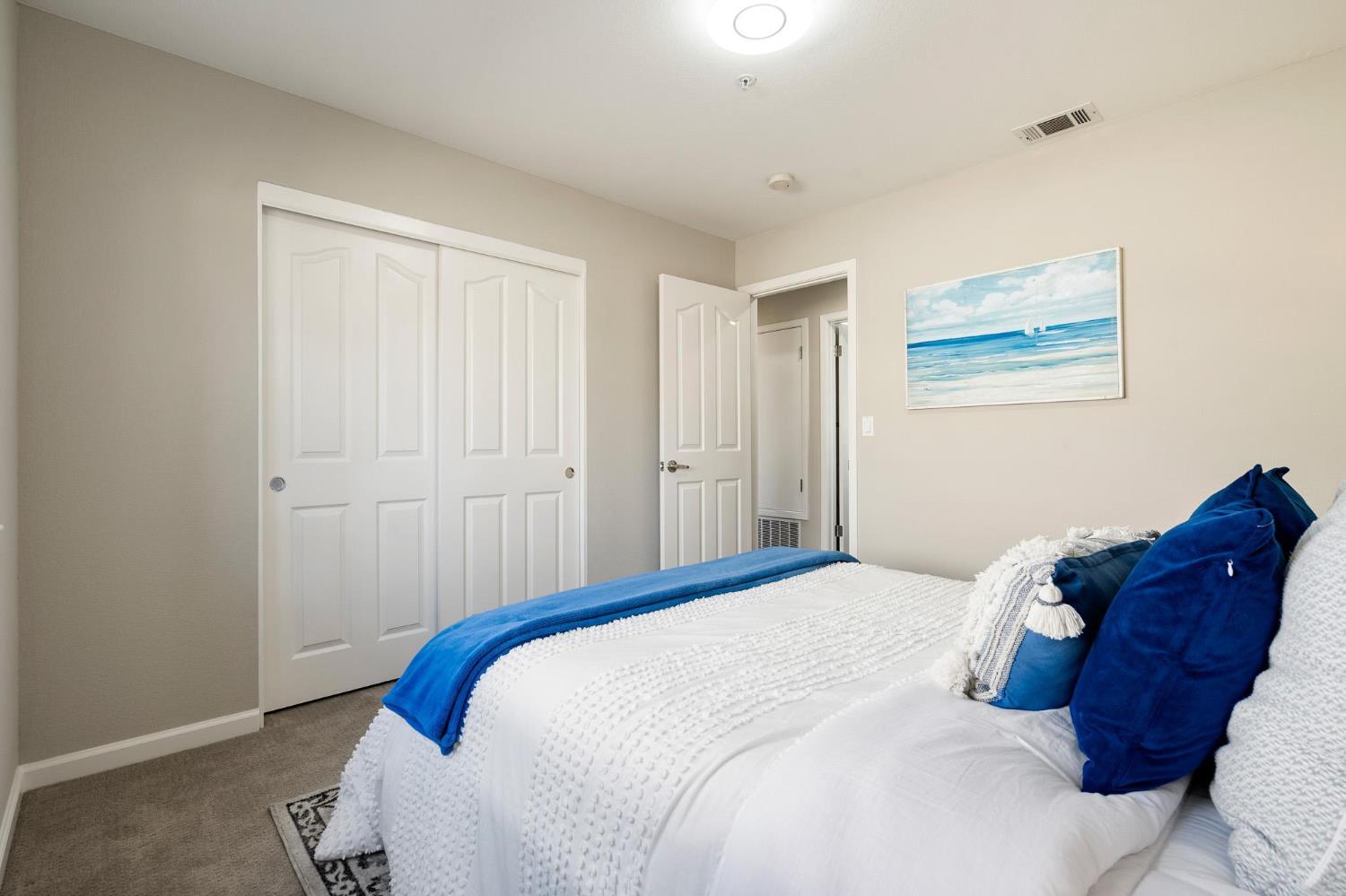 1363 Rincon Avenue Livermore, CA 94551 - Photo 42 of 65 a bedroom with a bed and a painting