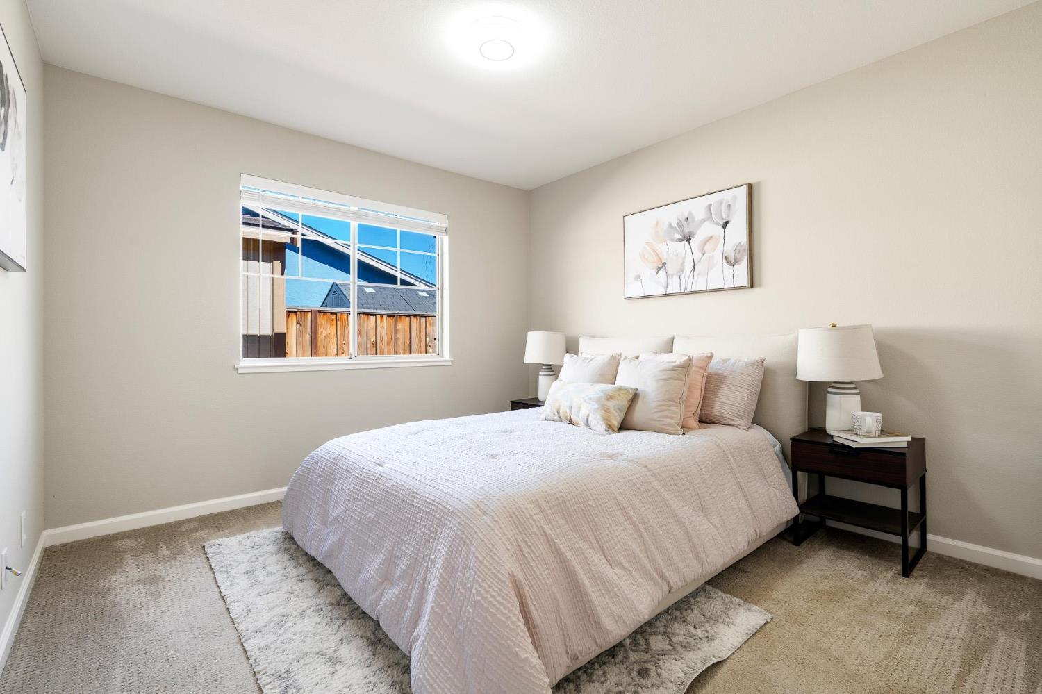 1363 Rincon Avenue Livermore, CA 94551 - Photo 47 of 65 a bedroom with a bed and a night stand