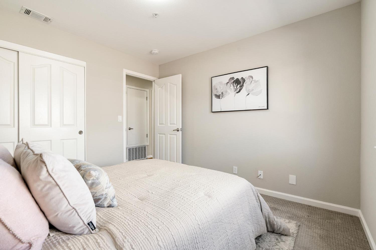 1363 Rincon Avenue Livermore, CA 94551 - Photo 48 of 65 a bedroom with a bed and a couch