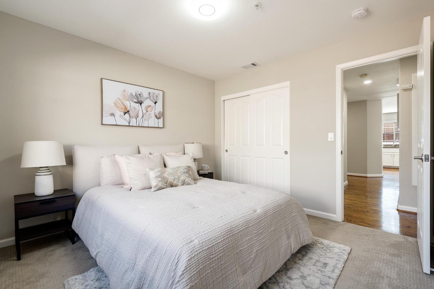 1363 Rincon Avenue Livermore, CA 94551 - Photo 49 of 65 a bedroom with a bed and a lamp