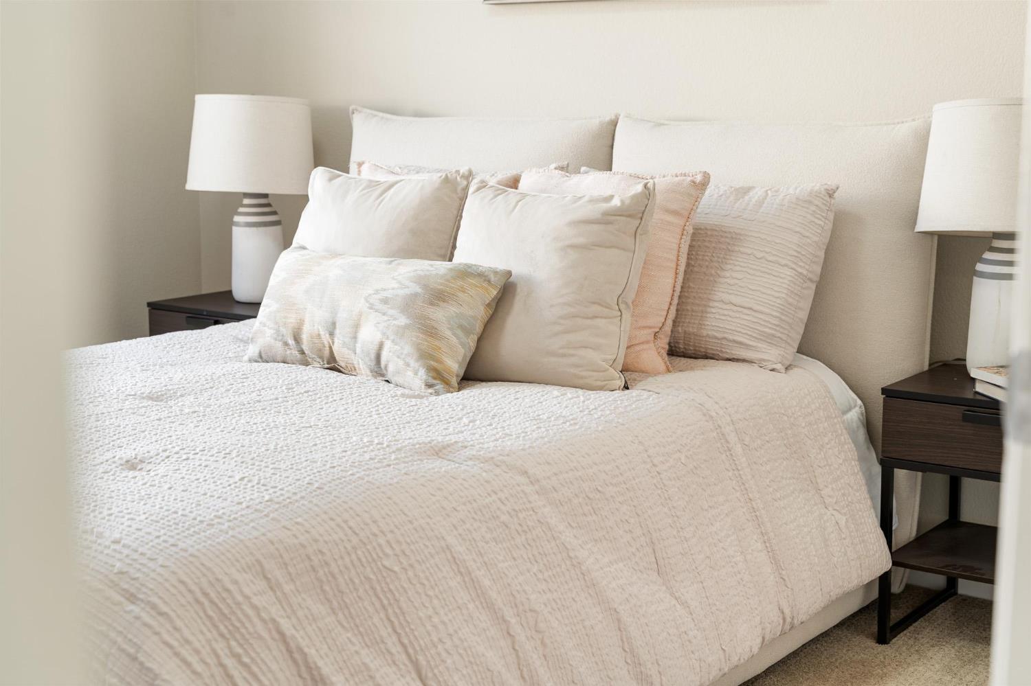 1363 Rincon Avenue Livermore, CA 94551 - Photo 50 of 65 a large white bed in a white room