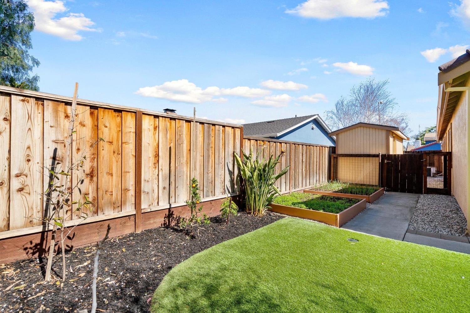 1363 Rincon Avenue Livermore, CA 94551 - Photo 63 of 65 a front view of a house with garden
