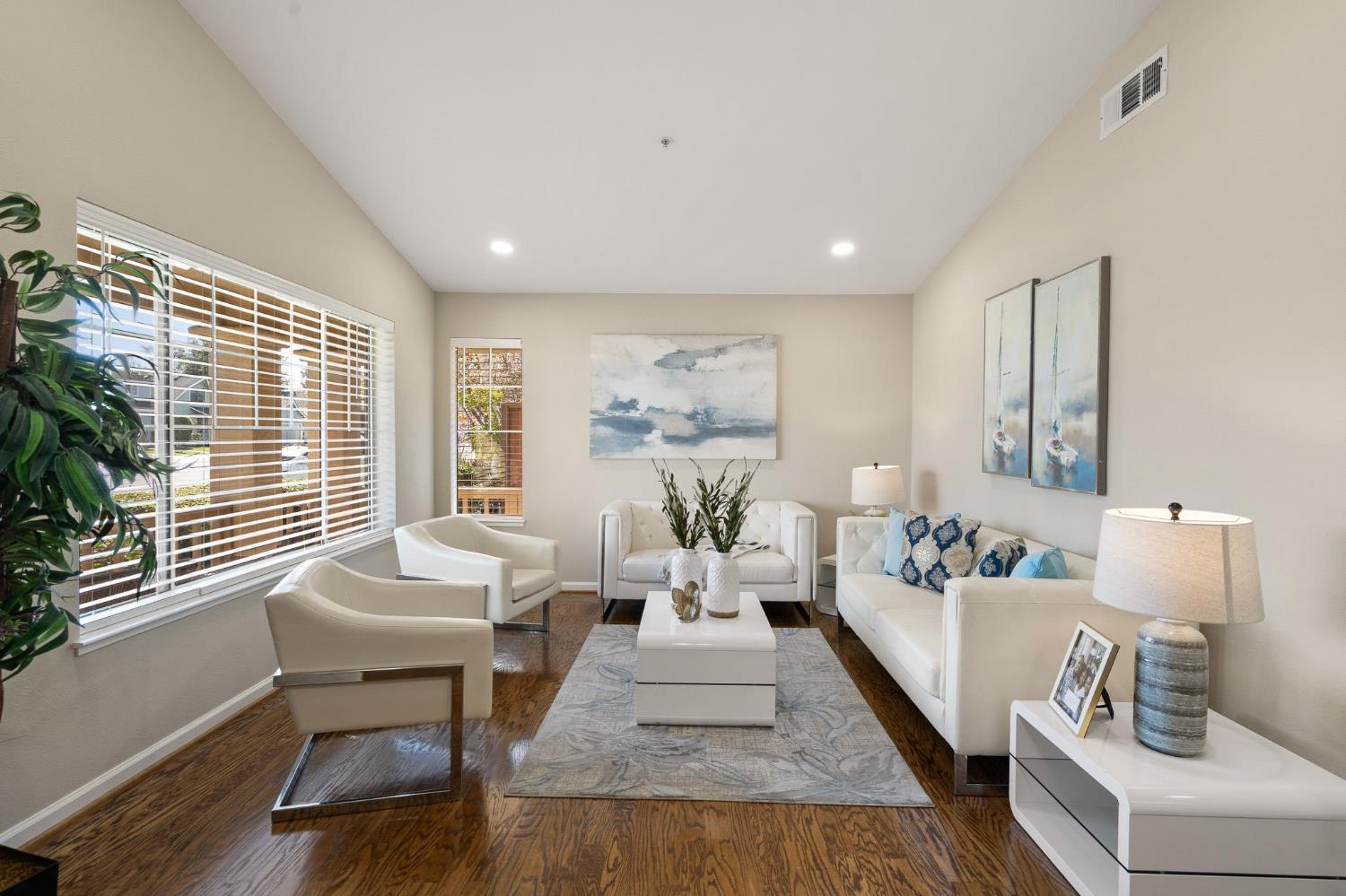 1363 Rincon Avenue Livermore, CA 94551 - Photo 9 of 65 a living room with furniture and wooden floor